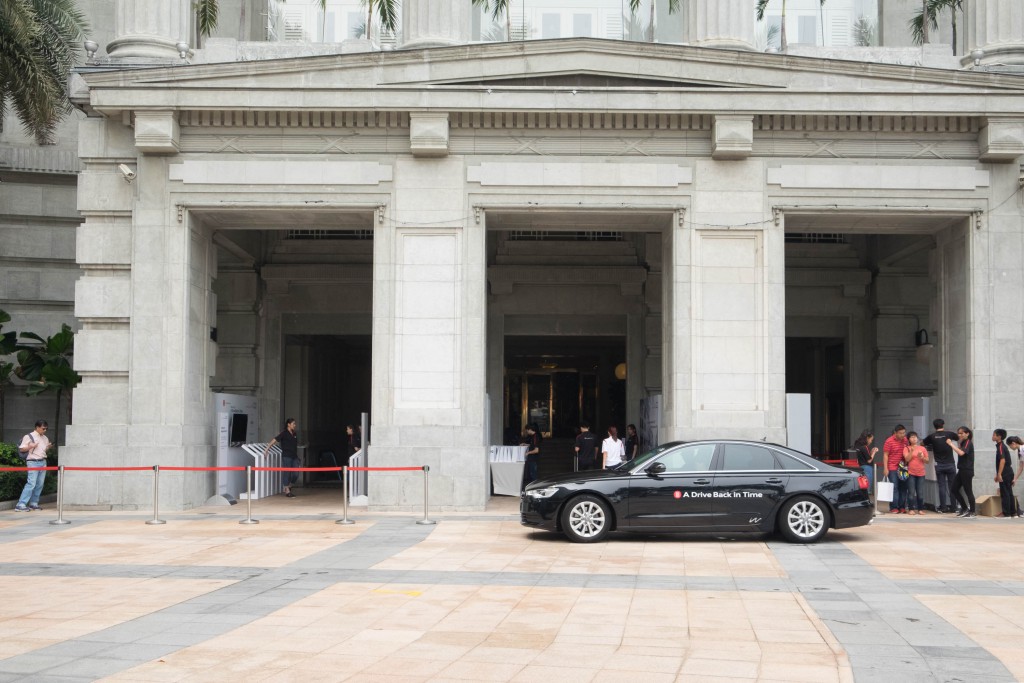 One of the Audi cars in front of Fullerton Hotel